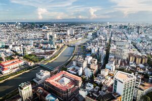 Skyline of Metropolis along the Puracé river